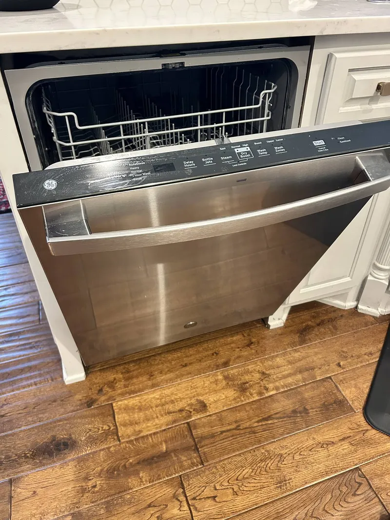 Dishwasher repair job by Quick Repair Co