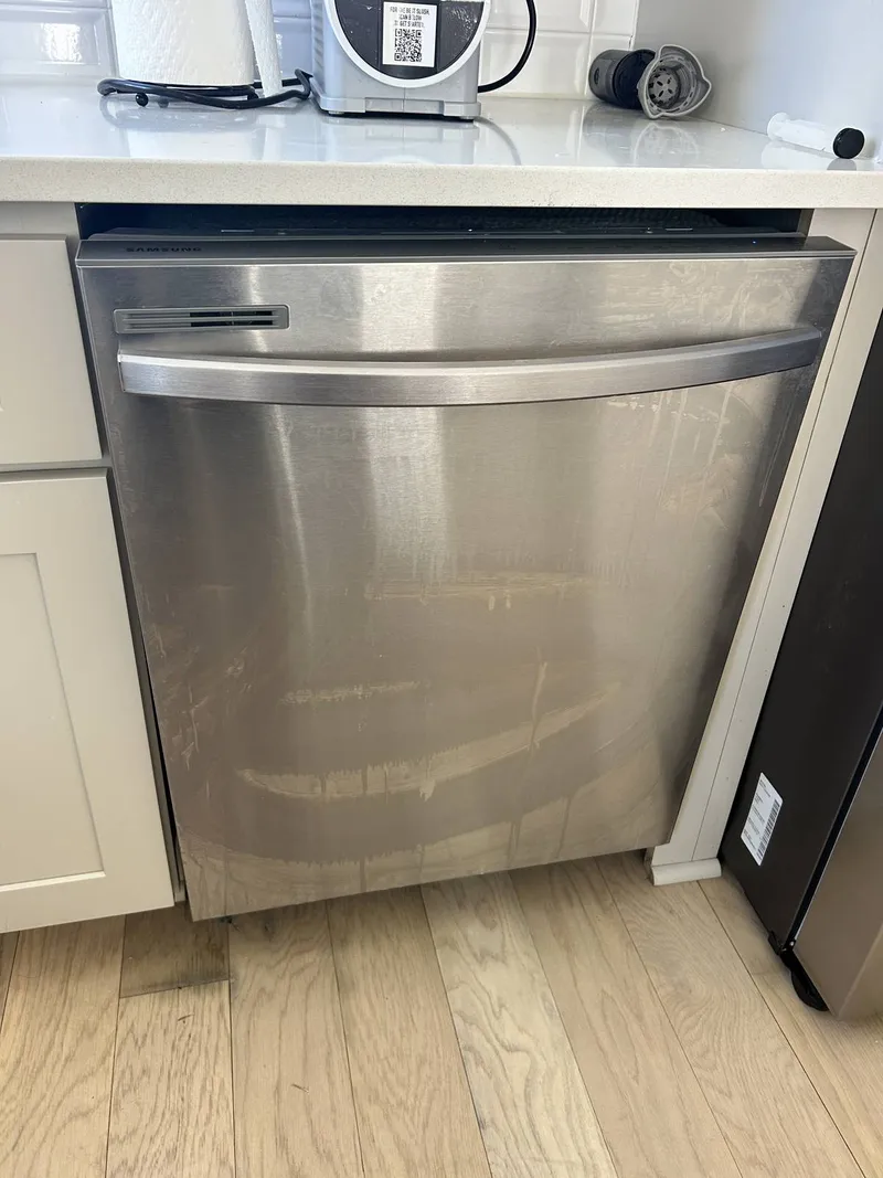 Dishwasher repair job by Quick Repair Co