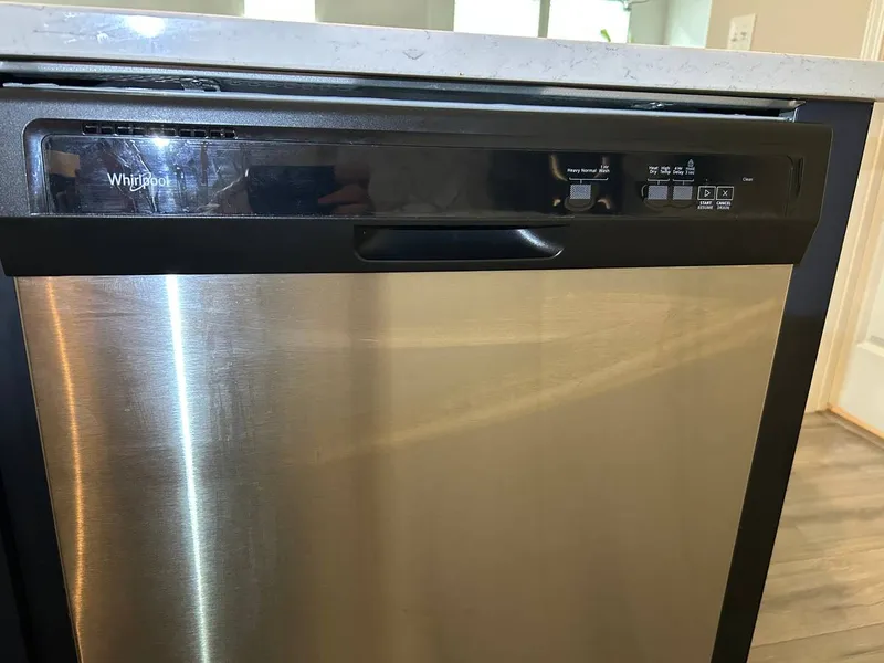 Dishwasher repair job by Quick Repair Co