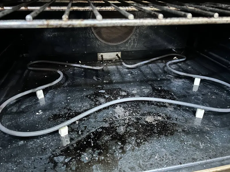 Oven repair job by Quick Repair Co