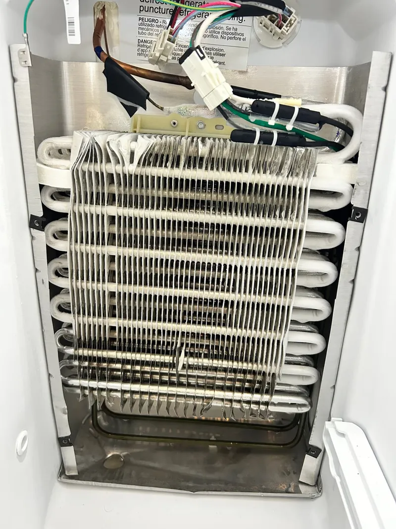 Refrigerator repair job by Quick Repair Co