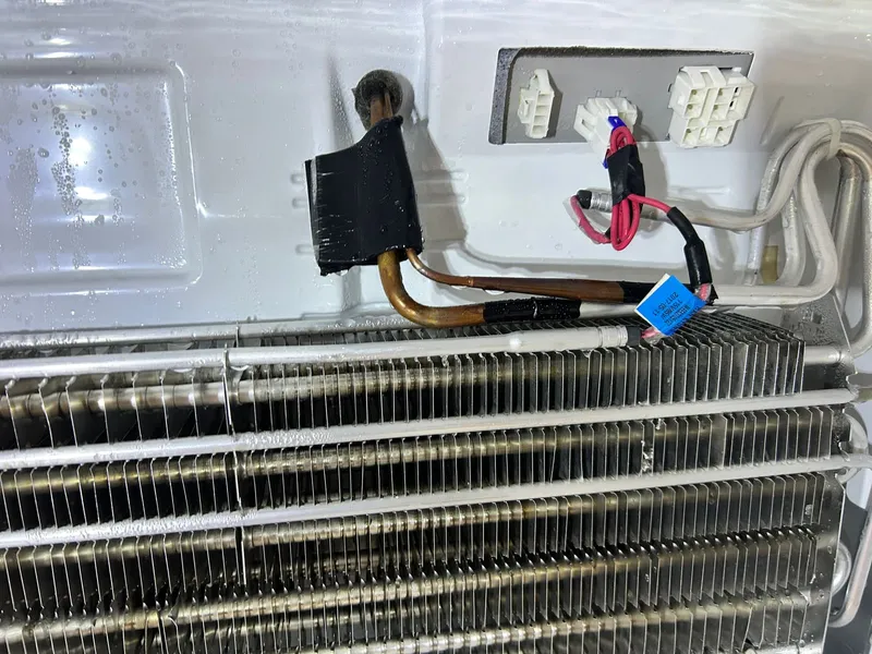 Refrigerator repair job by Quick Repair Co