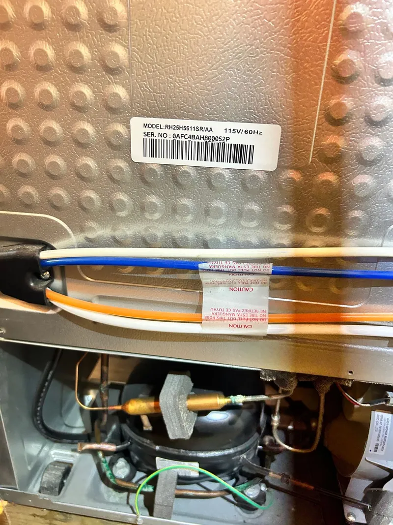 Refrigerator repair job by Quick Repair Co