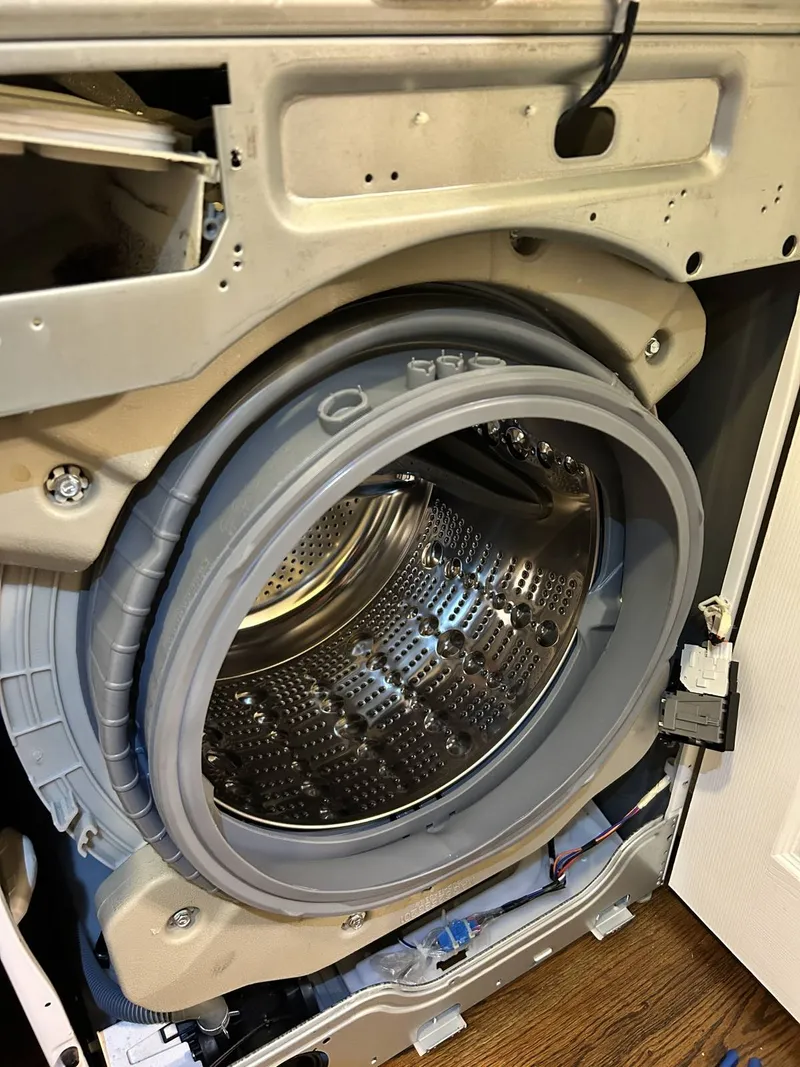 Washer repair job by Quick Repair Co