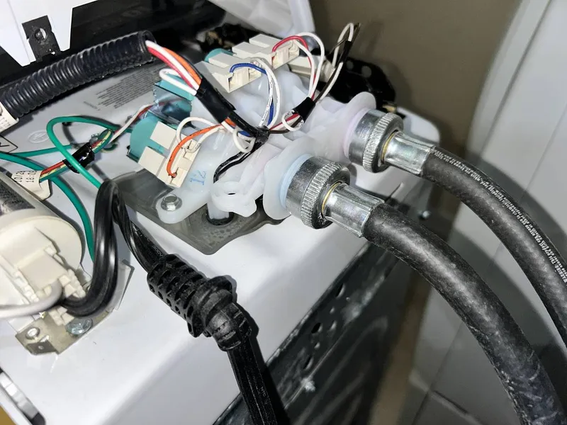 Washer repair job by Quick Repair Co