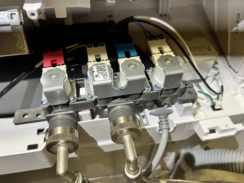 Washer repair job by Quick Repair Co