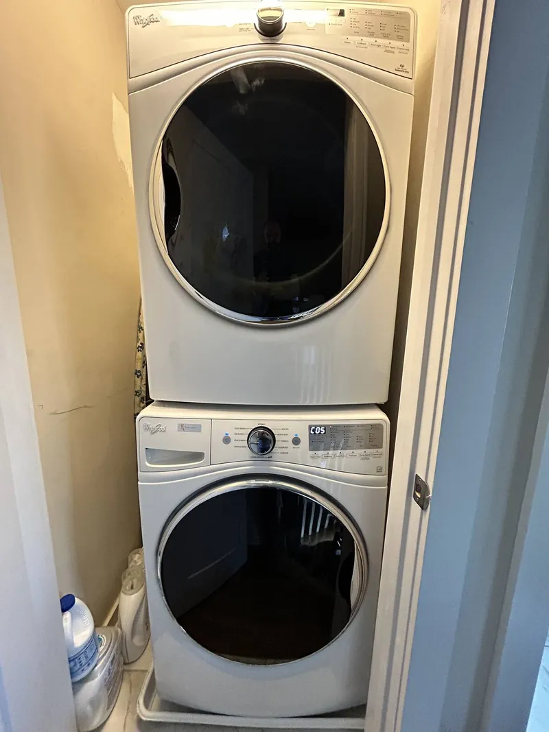 Washer repair job by Quick Repair Co