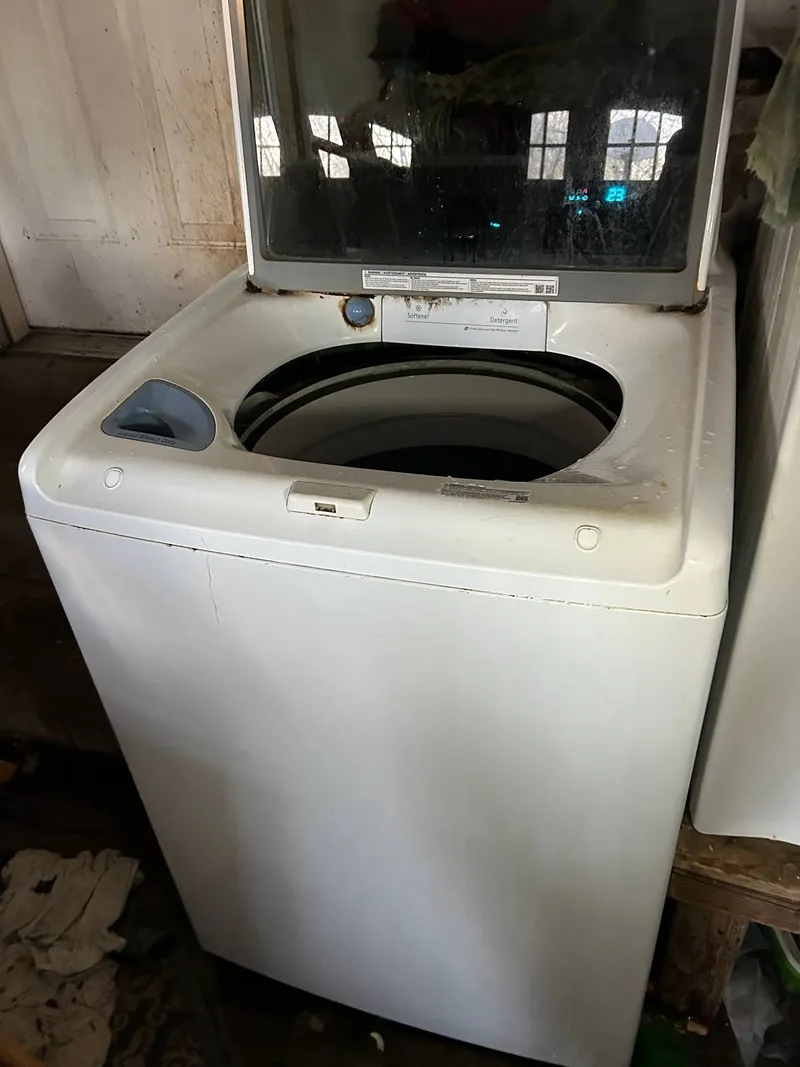 Washer repair job by Quick Repair Co