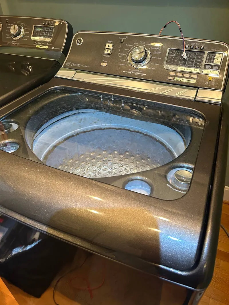 Washer repair job by Quick Repair Co