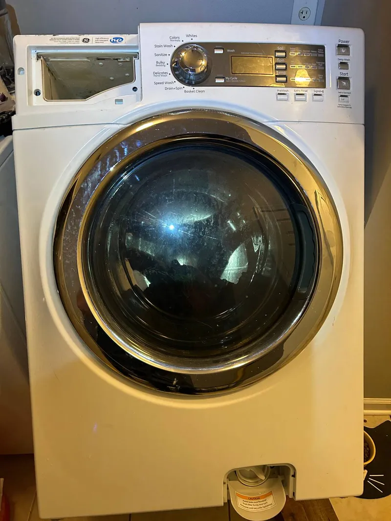 Washer repair job by Quick Repair Co