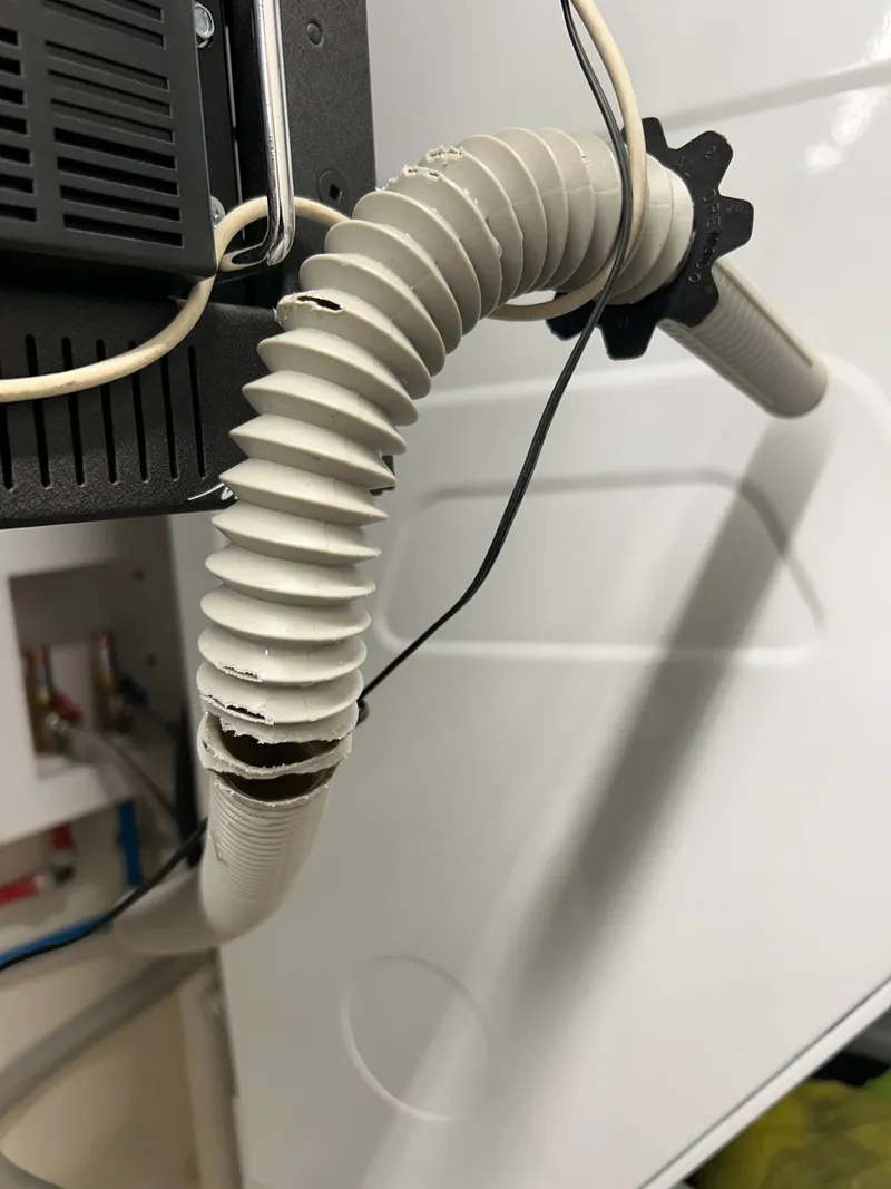 Washer repair job by Quick Repair Co